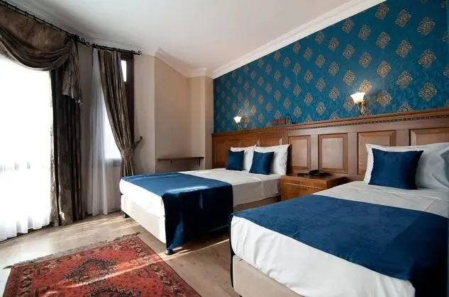 Deluxe Üç Kişilik Oda