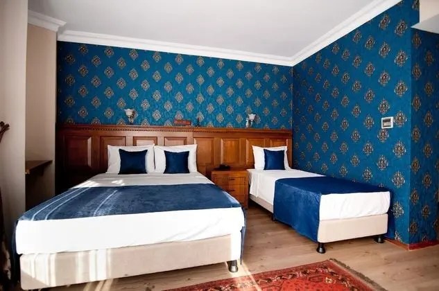Deluxe Üç Kişilik Oda