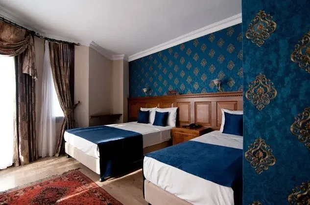 Deluxe Üç Kişilik Oda