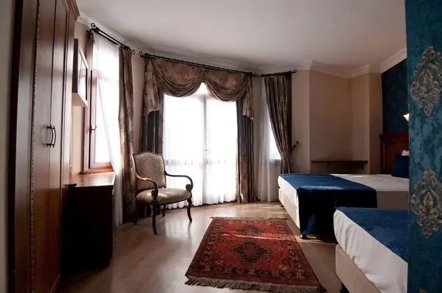 Deluxe Üç Kişilik Oda