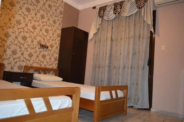 Üç Kişilik Oda