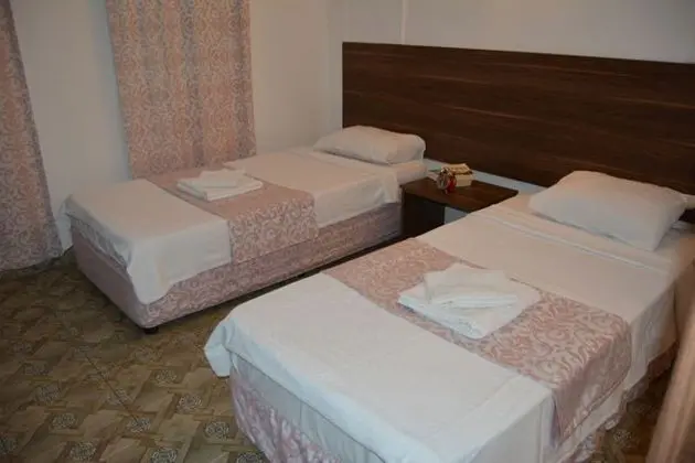 2 Tek Yataklı Oda