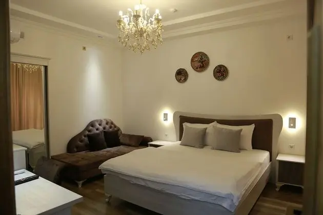 Deluxe Tek Büyük veya İki Ayrı Yataklı Oda