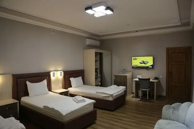 Deluxe Tek Büyük veya İki Ayrı Yataklı Oda