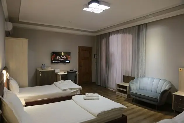 Deluxe Tek Büyük veya İki Ayrı Yataklı Oda