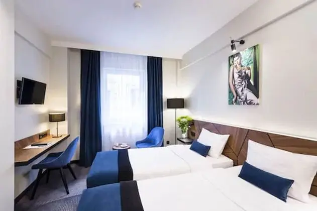 Premium Tek Büyük veya İki Ayrı Yataklı Oda