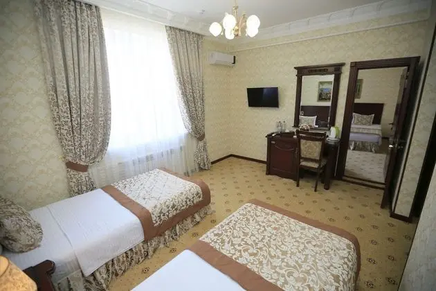 Deluxe Tek Büyük veya İki Ayrı Yataklı Oda