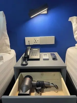 b. Standard Queen Room