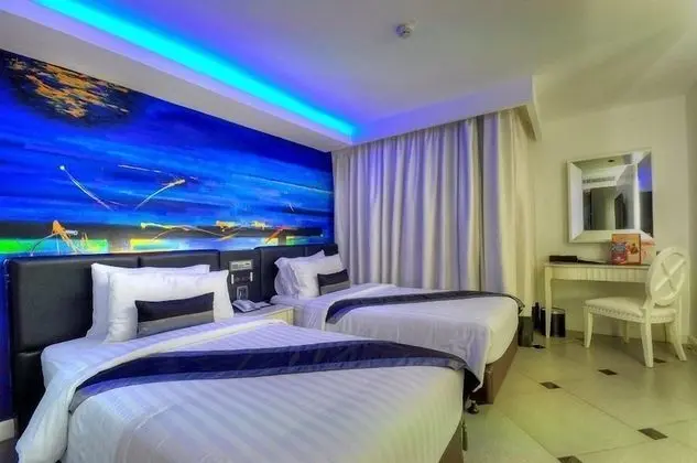 Deluxe Tek Büyük veya İki Ayrı Yataklı Oda