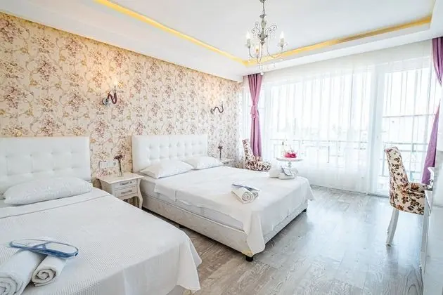 Deluxe Üç Kişilik Oda