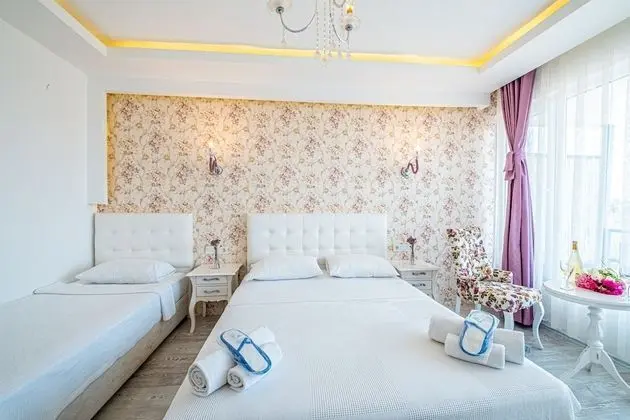 Deluxe Üç Kişilik Oda