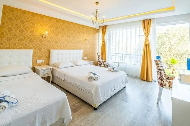 Deluxe Üç Kişilik Oda