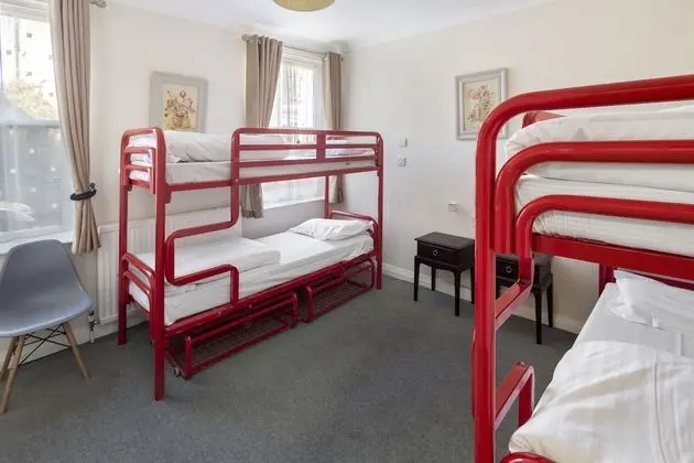 Bed in 4-bed mixed dormitory room ensuite