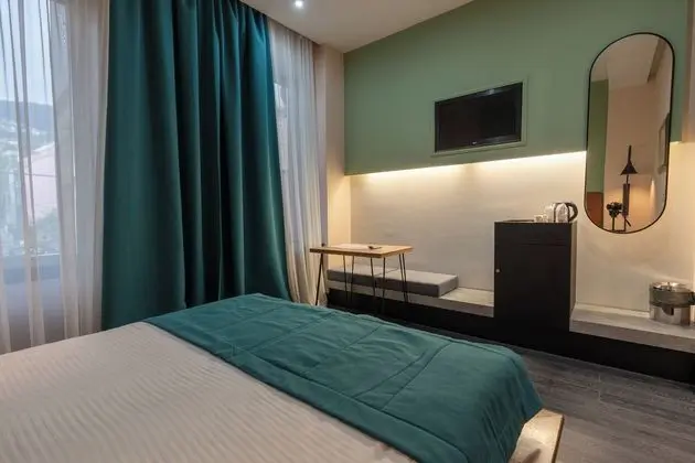 Deluxe Tek Büyük Yataklı Oda
