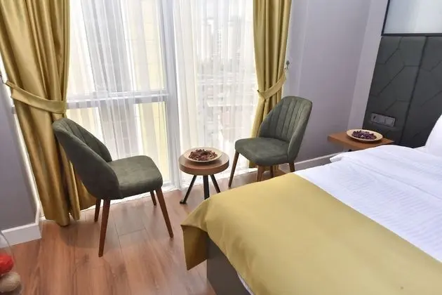 Business Tek Büyük veya İki Ayrı Yataklı Oda