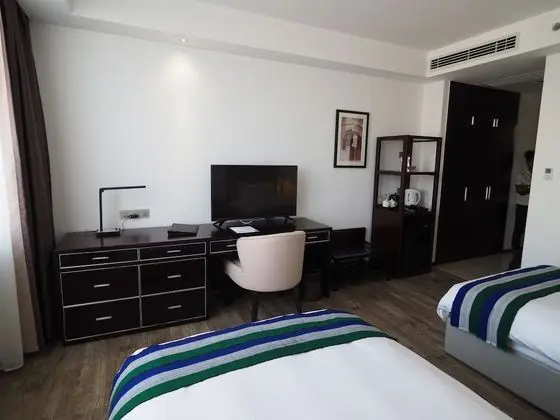 Deluxe Tek Büyük veya İki Ayrı Yataklı Oda