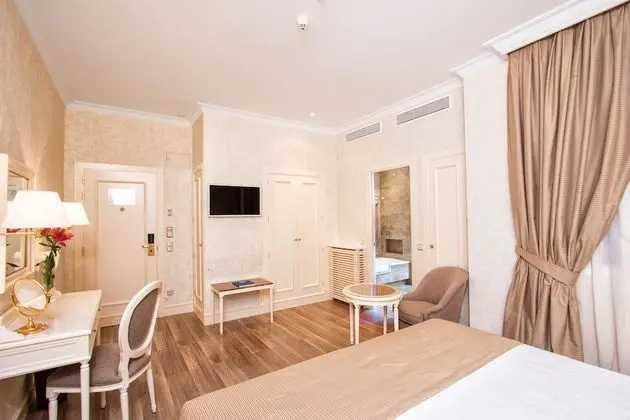 Deluxe Tek Büyük veya İki Ayrı Yataklı Oda
