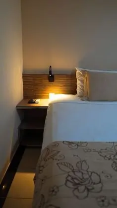 Quarto Duplo Superior com Vista Lateral do Mar