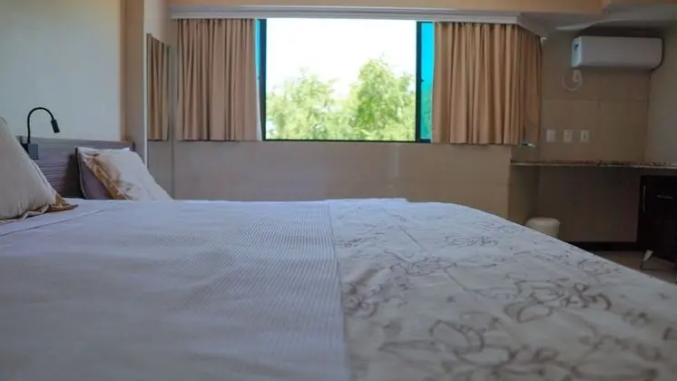 Quarto Duplo Superior com Vista Lateral do Mar