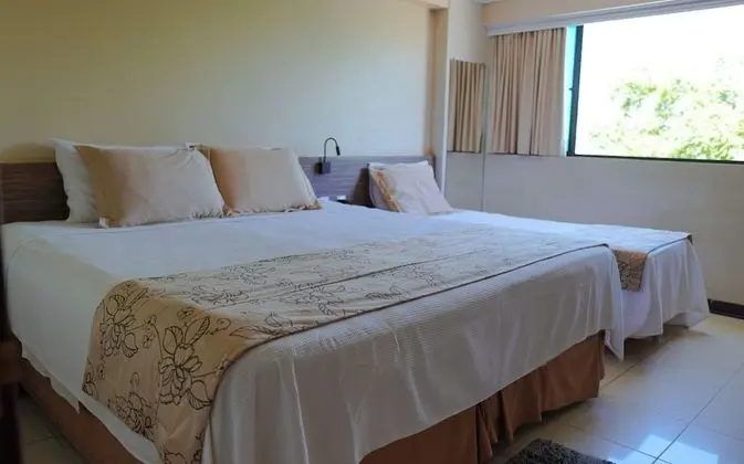 Quarto Triplo Superior com Vista Lateral do Mar