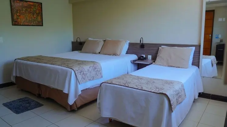 Quarto Triplo Superior com Vista Lateral do Mar