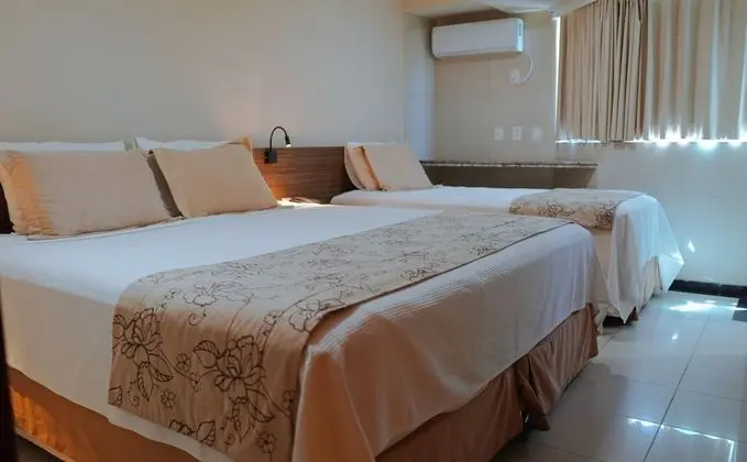 Quarto Triplo Superior com Vista Lateral do Mar