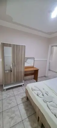 Havuz ve Bahçe Manzaralı 4 Kişilik Oda (İki Bölümlü)