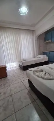 Şehir Manzaralı 4 Kişilik Oda ( İki Bölümlü)