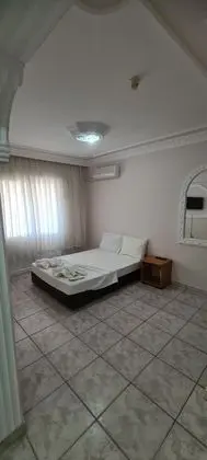 Şehir Manzaralı 5 Kişilik Oda