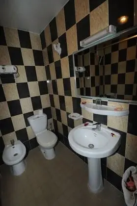 Tek Büyük veya İki Ayrı Yataklı Oda, Bahçe Manzaralı