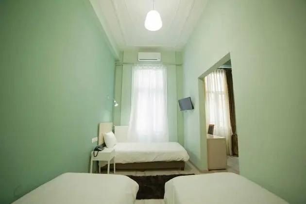 Üç Kişilik Oda