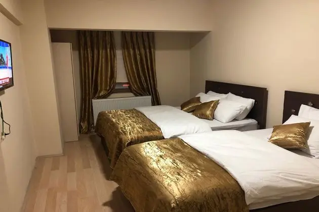 Üç Kişilik Oda