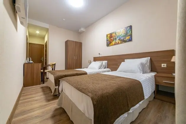 Economy Tek Büyük veya İki Ayrı Yataklı Oda