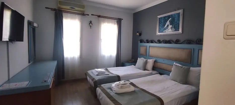 Üç Kişilik Oda
