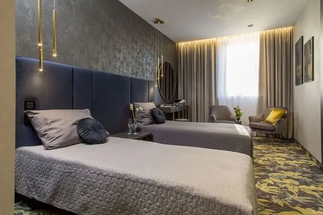 Deluxe Tek Büyük veya İki Ayrı Yataklı Oda
