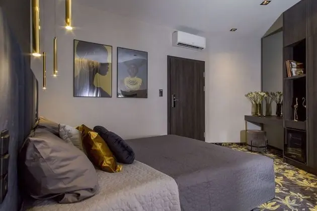 Deluxe Tek Büyük veya İki Ayrı Yataklı Oda