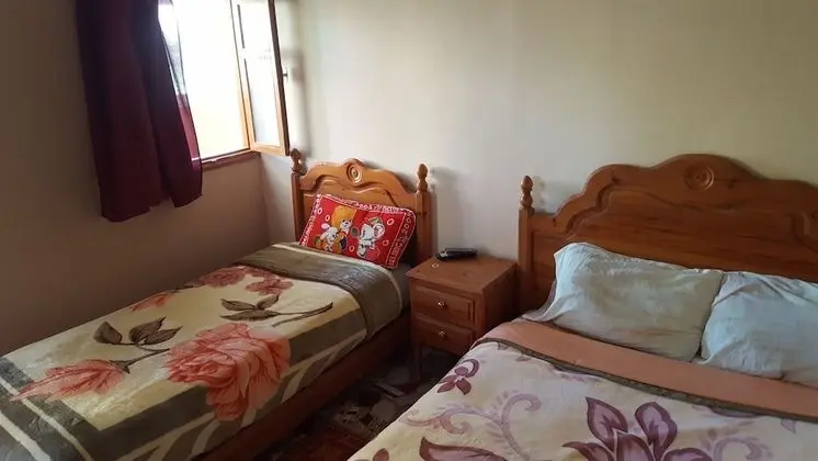 Üç Kişilik Oda