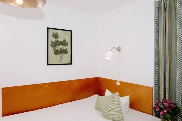 Basic Tek Büyük veya İki Ayrı Yataklı Oda