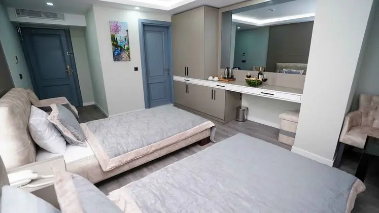 Deluxe Tek Büyük veya İki Ayrı Yataklı Oda