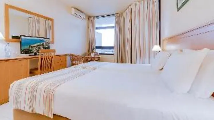 Üçlü