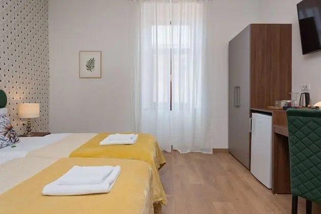 Grand Tek Büyük veya İki Ayrı Yataklı Oda