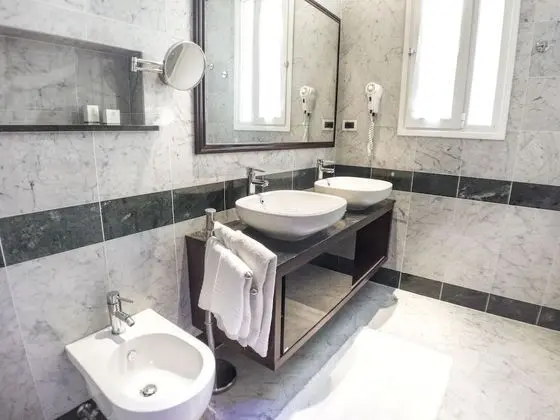 Exclusive Tek Büyük veya İki Ayrı Yataklı Oda