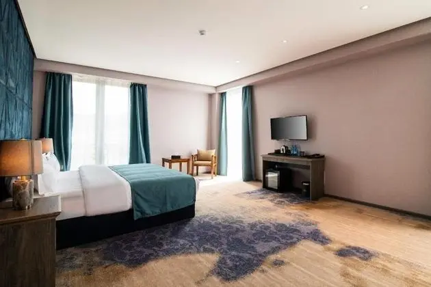 Deluxe Tek Büyük Yataklı Oda