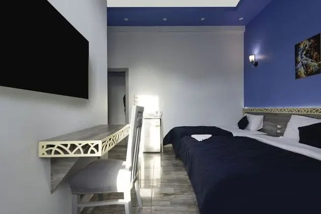 Deluxe Dört Kişilik Oda