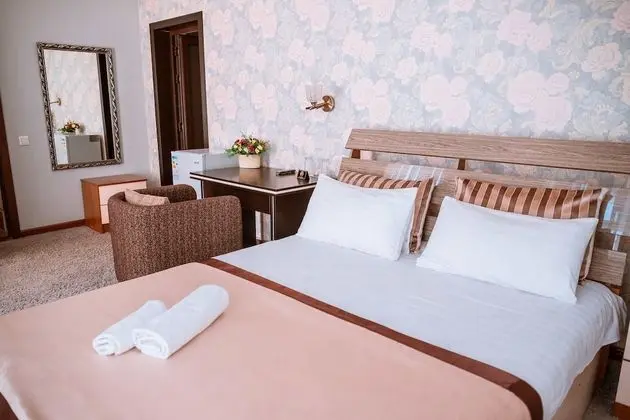 Deluxe Tek Büyük veya İki Ayrı Yataklı Oda