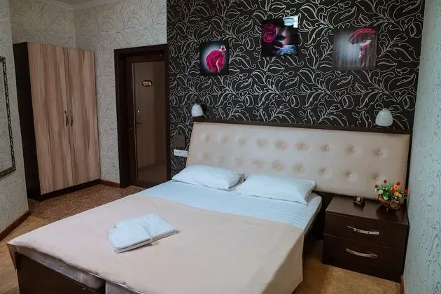 Deluxe Tek Büyük veya İki Ayrı Yataklı Oda