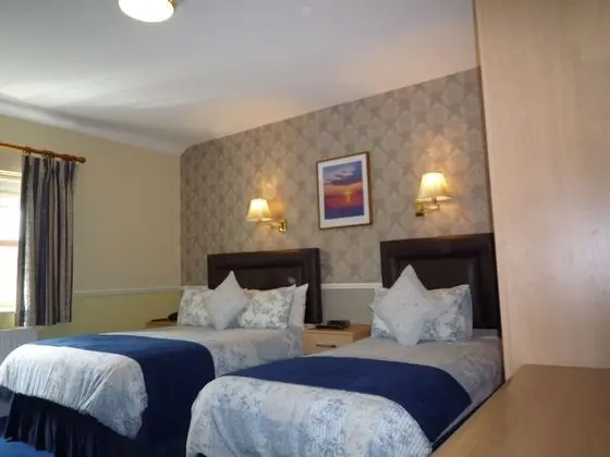 Tek Büyük veya İki Ayrı Yataklı Oda (Room Only)