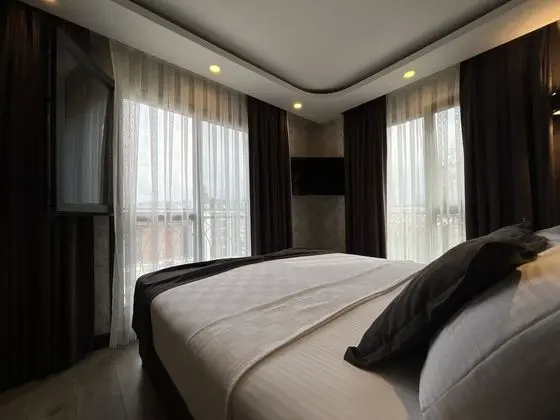 City Tek Büyük Yataklı Oda