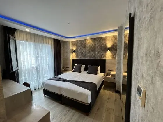 Comfort Tek Büyük veya İki Ayrı Yataklı Oda