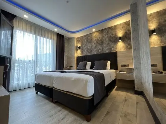 Comfort Tek Büyük veya İki Ayrı Yataklı Oda